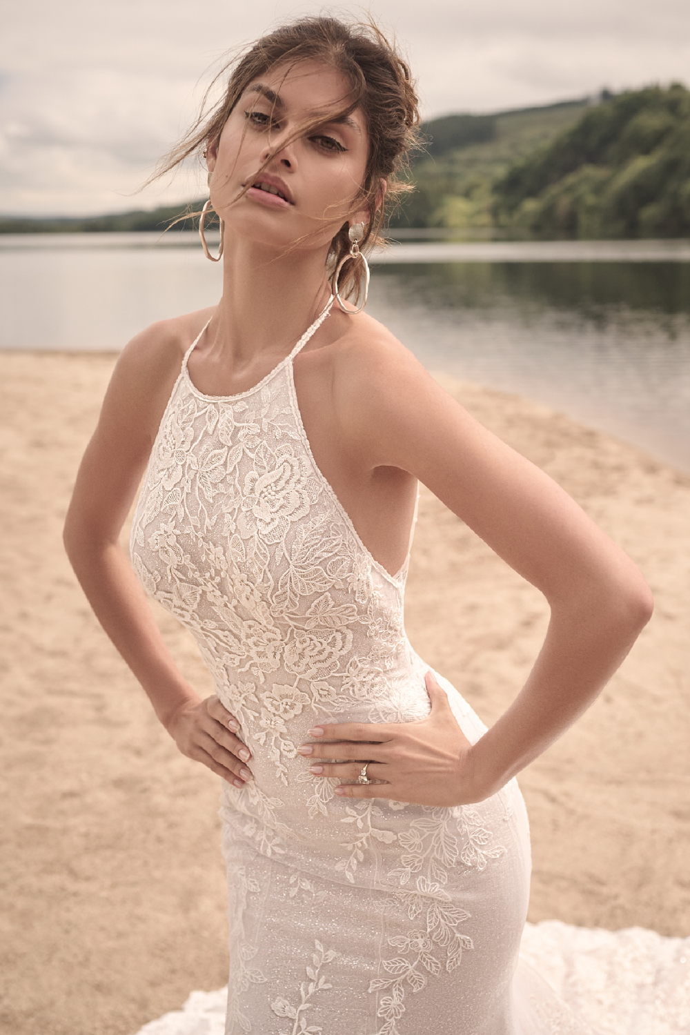 Model wearing white Maggie Sottero dress