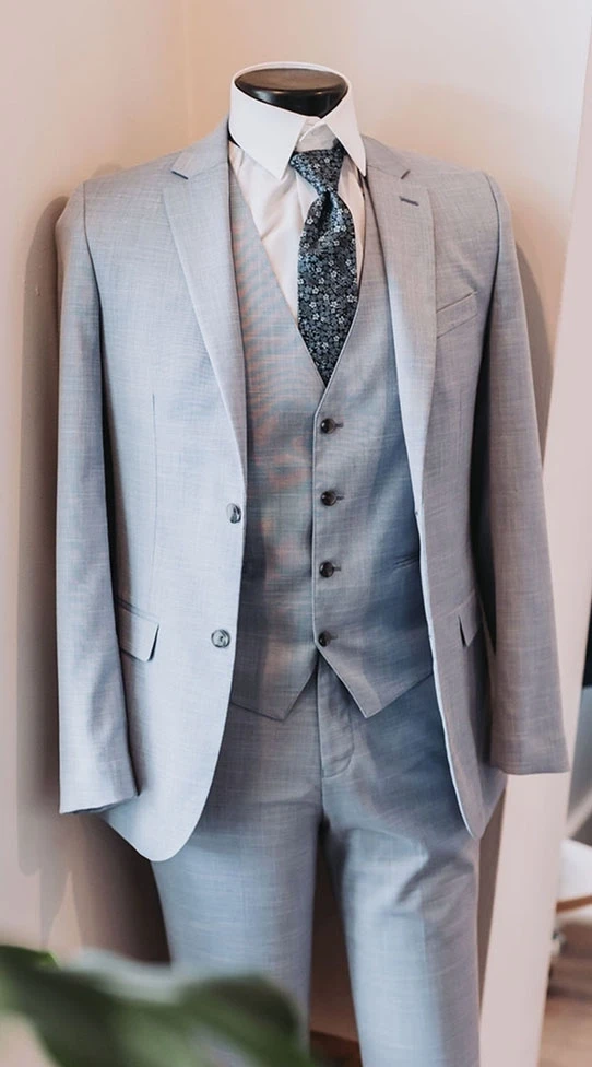 Model wearing a gray suit
