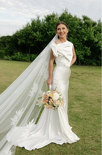 Model wearing a white bridal gown