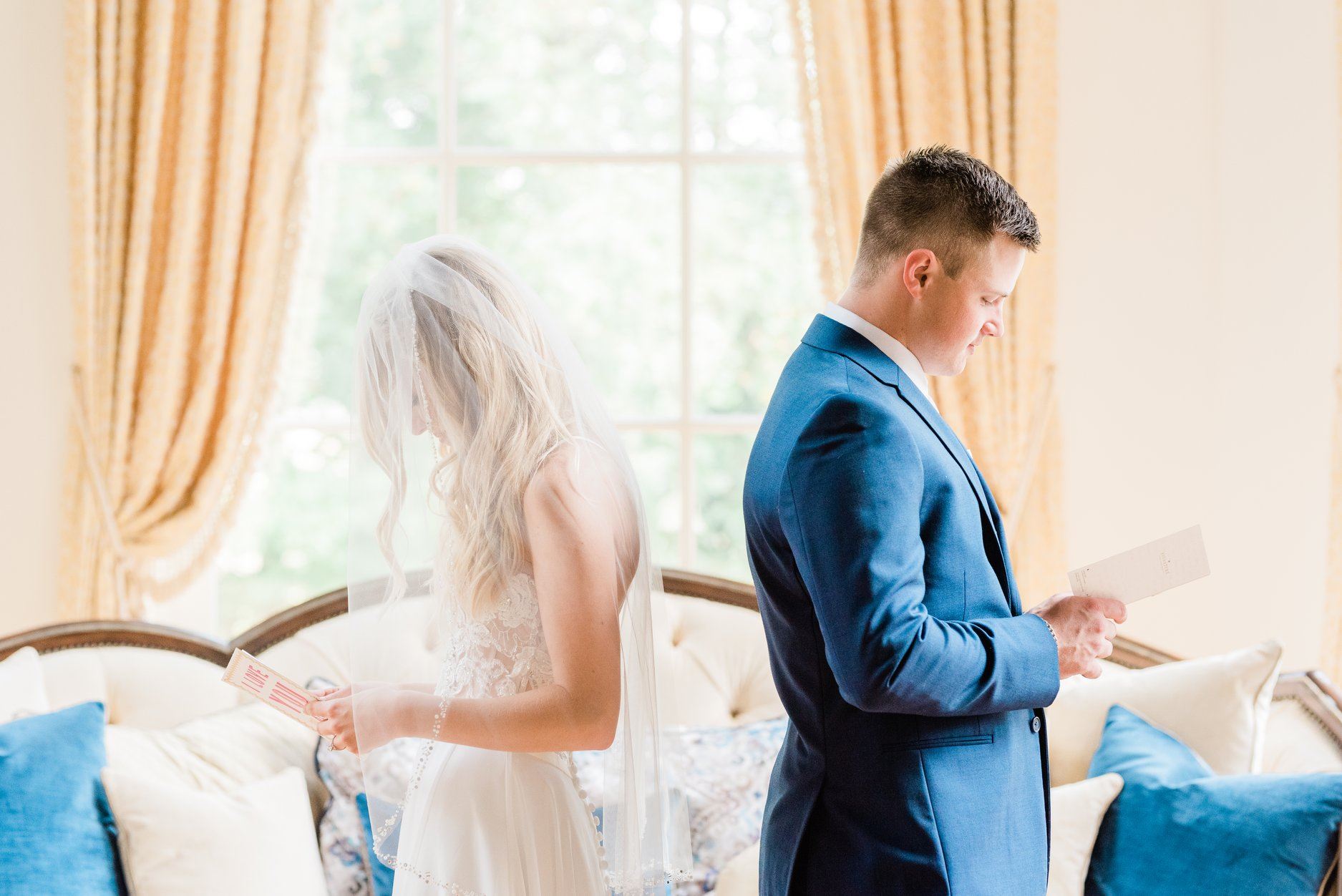 Сouple wearing a white gown and a blue suit